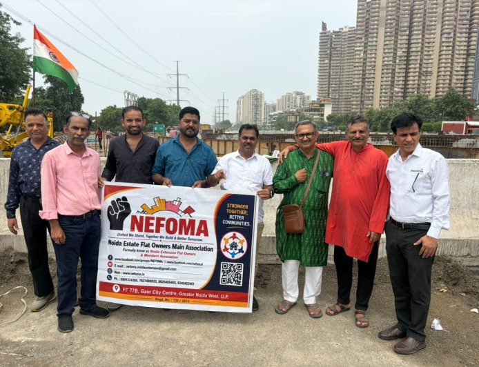 चार मूर्ति अंडरपास की धीमी रफ्तार के खिलाफ नेफोमा का प्रदर्शन, जल्द निर्माण पूरा करने की मांग